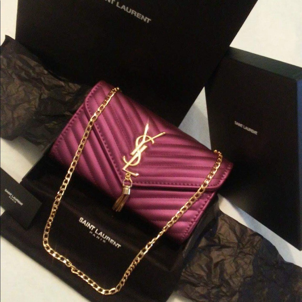 YSL Clutch with gold purse chain and tassel